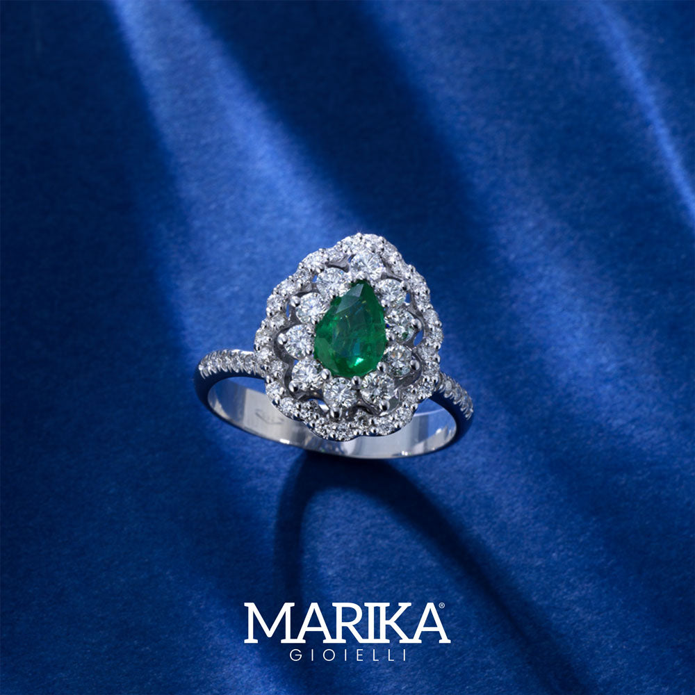 18KT WHITE GOLD DROP RING WITH DIAMONDS AND EMERALD