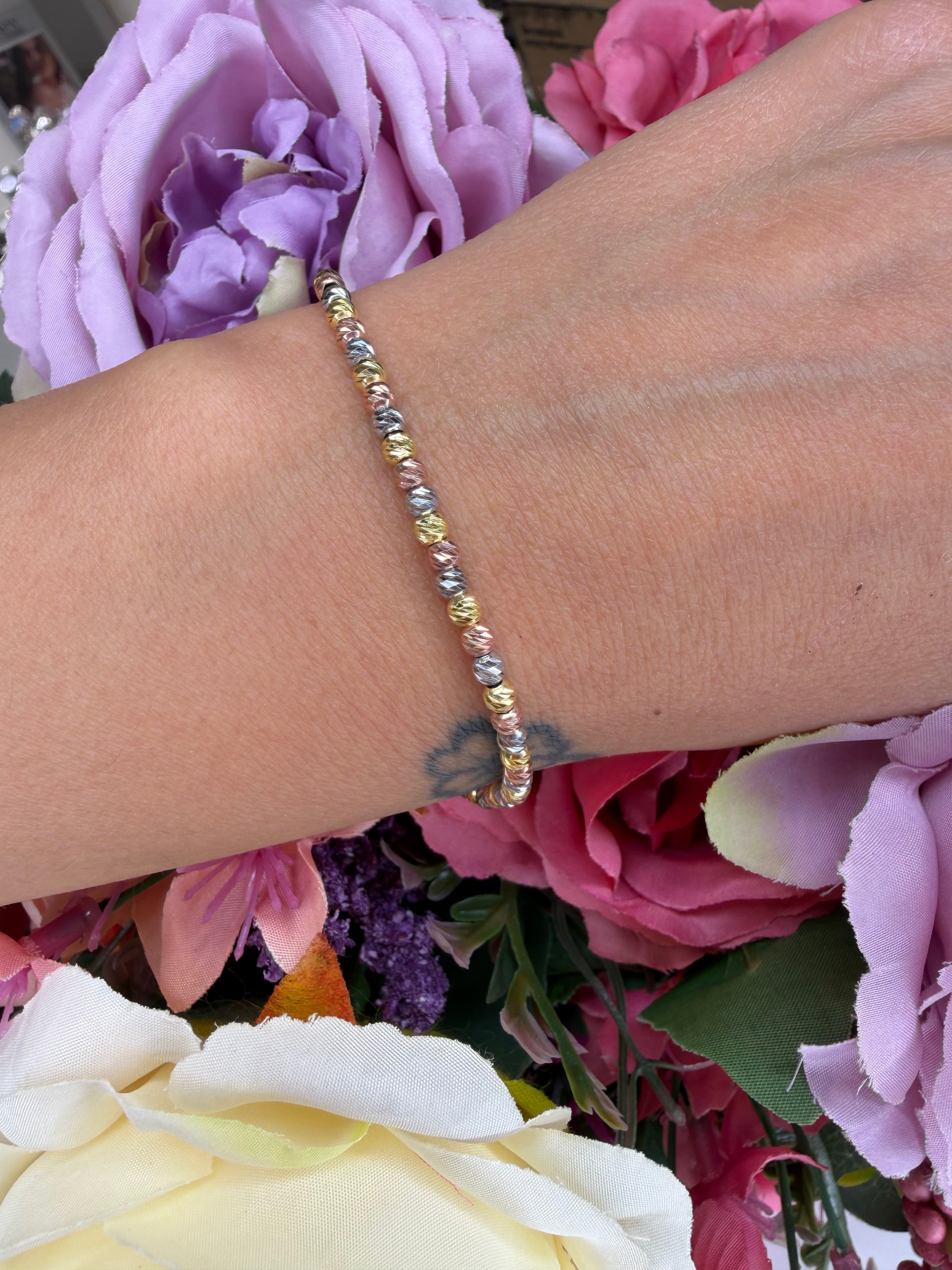 BRACCIALE TRICOLORE CON SFERE DIAMANTATE GIALLO BIANCO E ROSÉ IN ARGENTO 925
