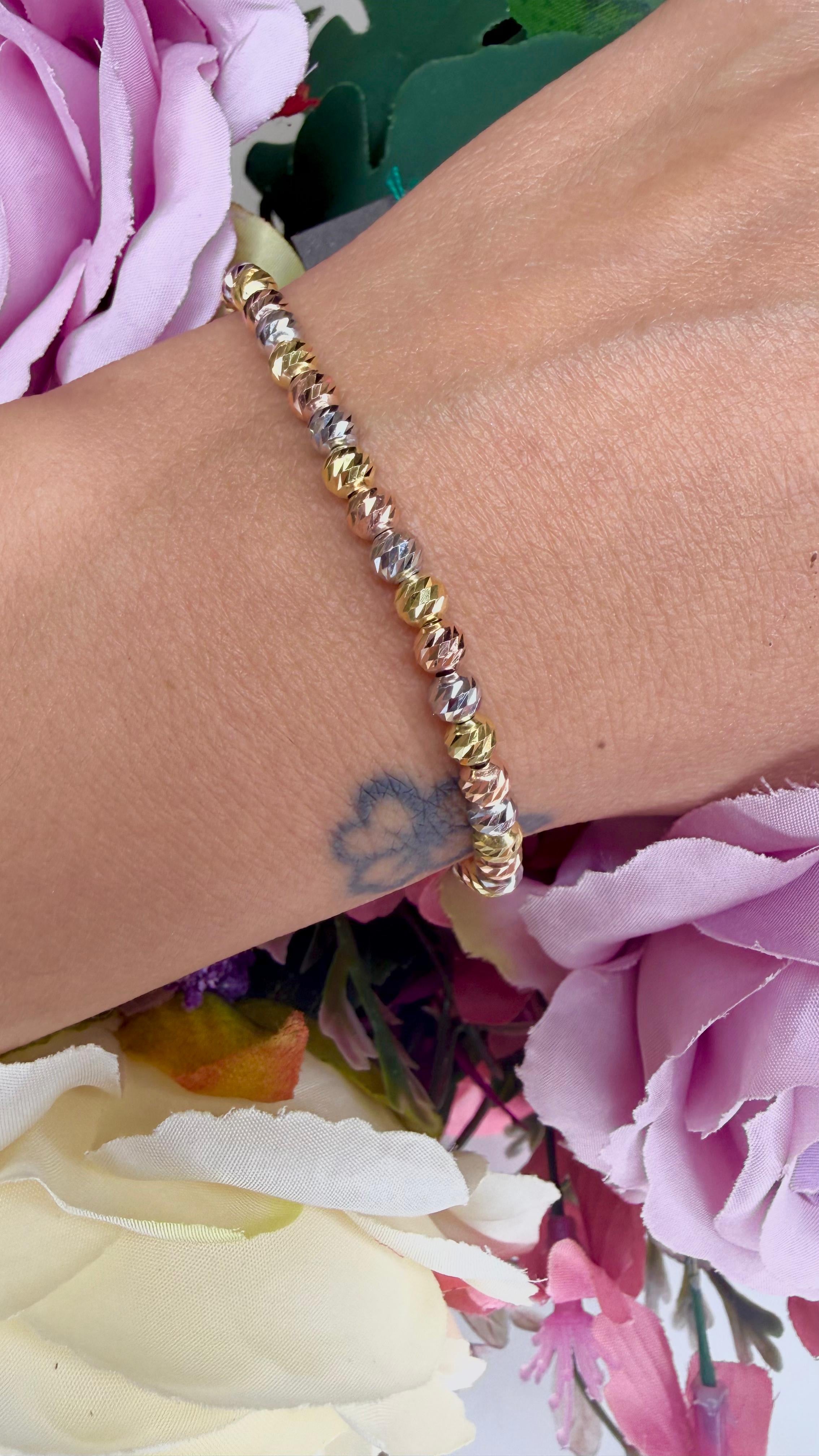 BRACCIALE TRICOLORE CON SFERE DIAMANTATE GIALLO BIANCO E ROSÉ IN ARGENTO 925