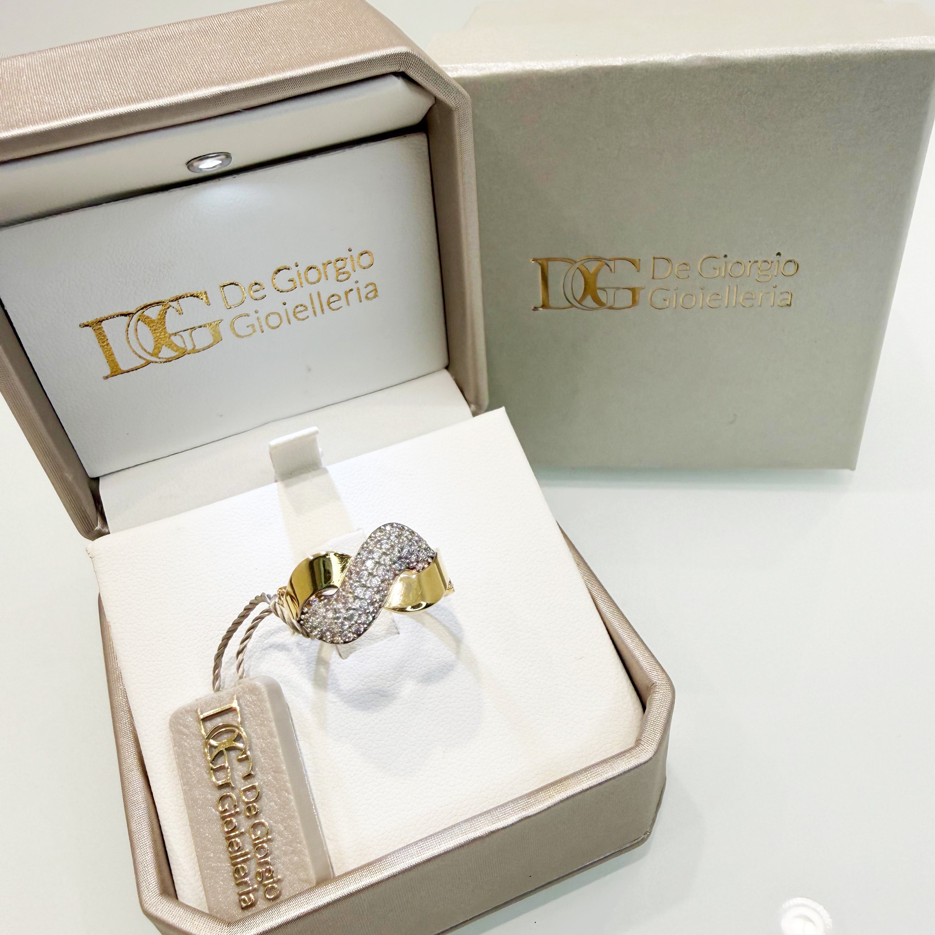 Anello fascia intrecciata in oro giallo 18KT (750) con pavé di zirconi bianchi - Made in Italy