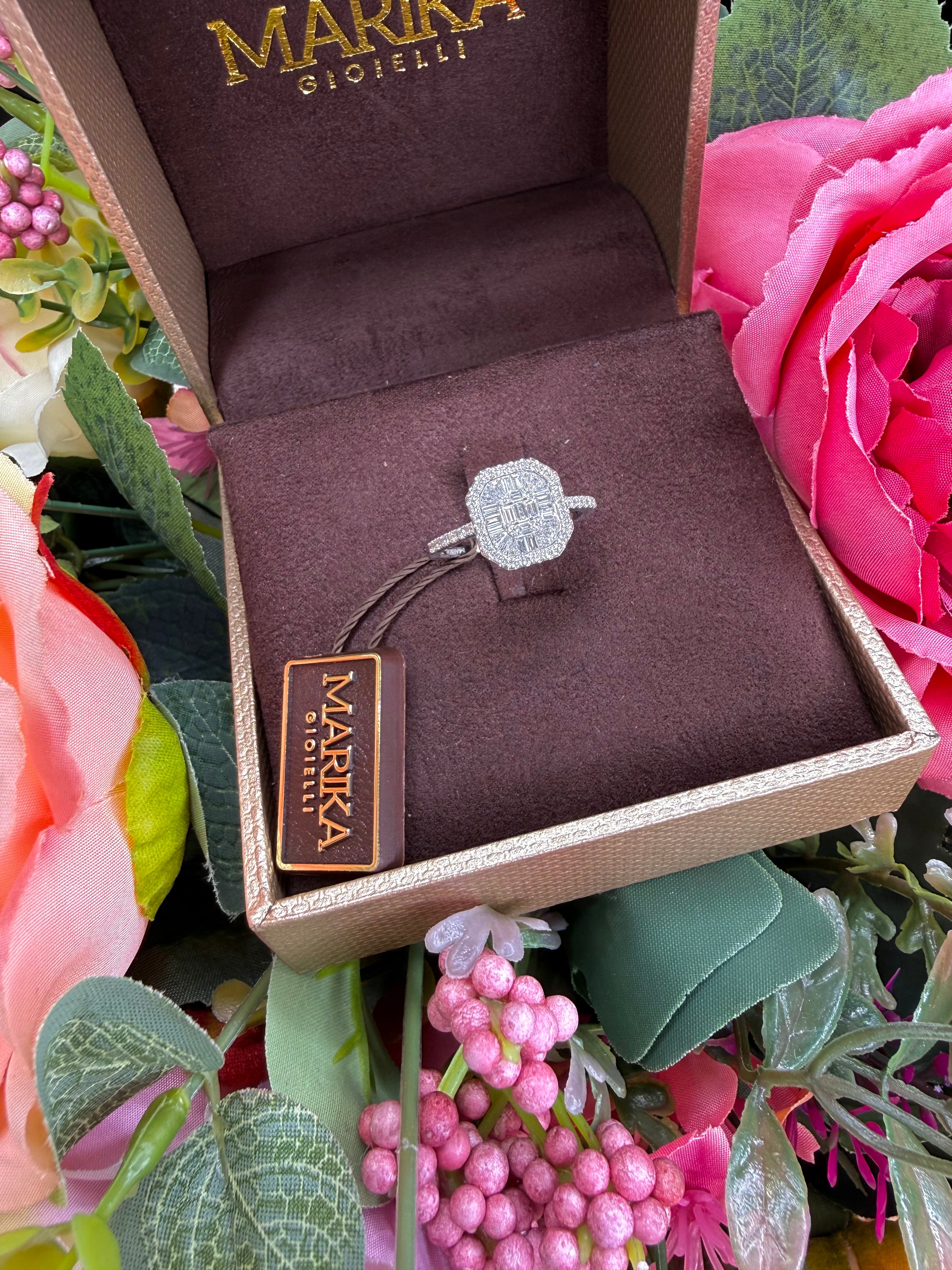18KT WHITE GOLD OCTAGONAL RING WITH DIAMONDS AND BAGUETTES