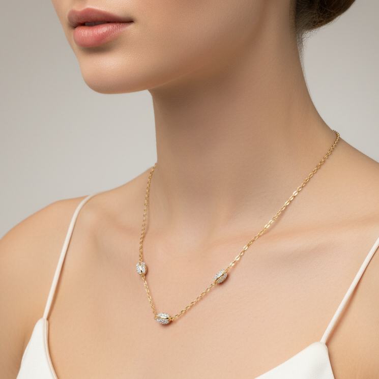 Collana con elementi ovali e zirconi in oro giallo e bianco 18KT (750) – Made in Italy
