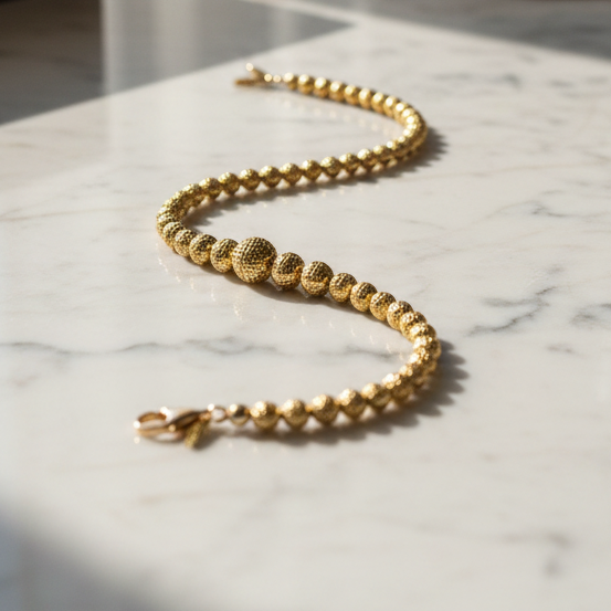 Bracciale sfere diamantate in oro giallo 18KT (750) – Elegante effetto luminoso