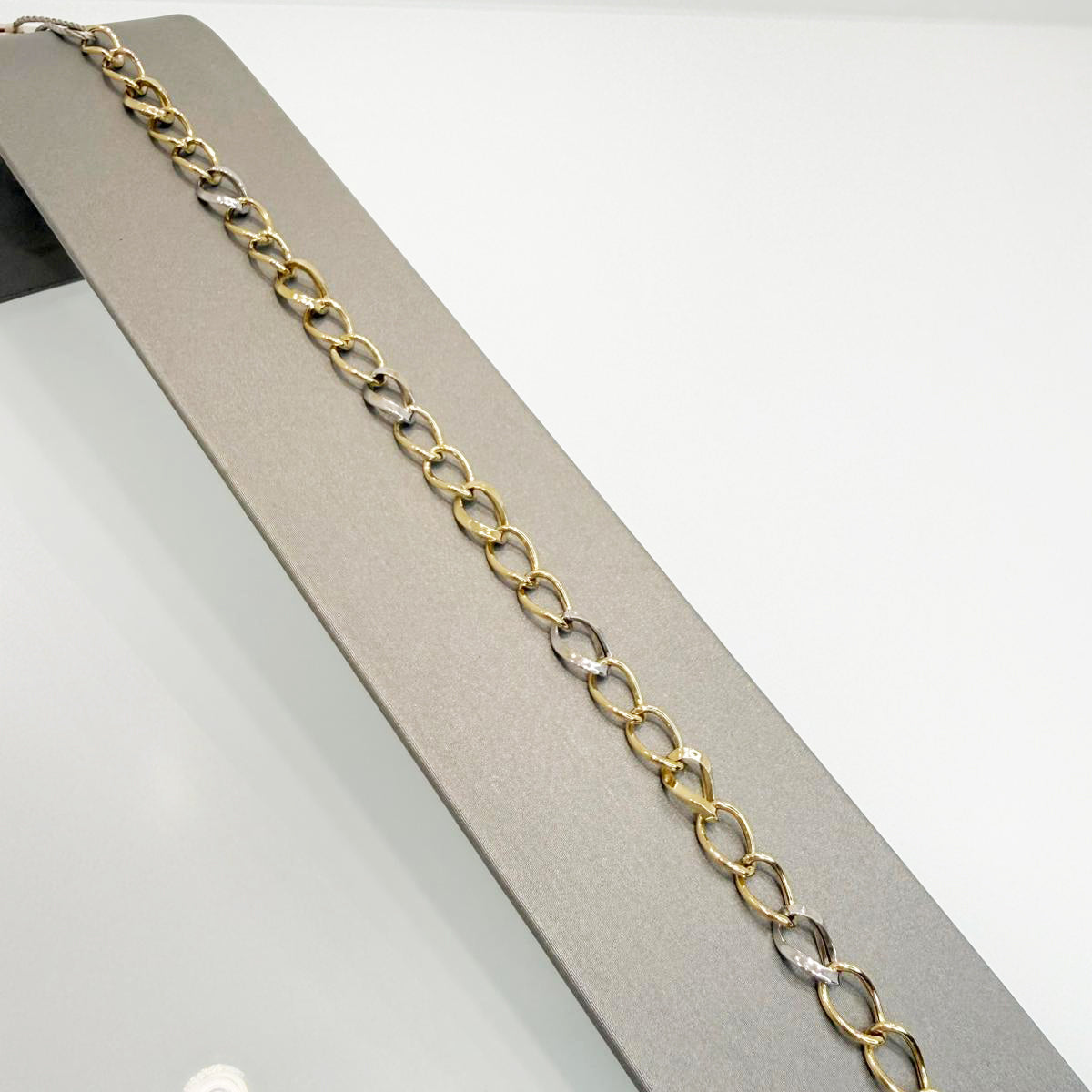 Bracciale in oro giallo e bianco 18KT (750) a maglia alternata