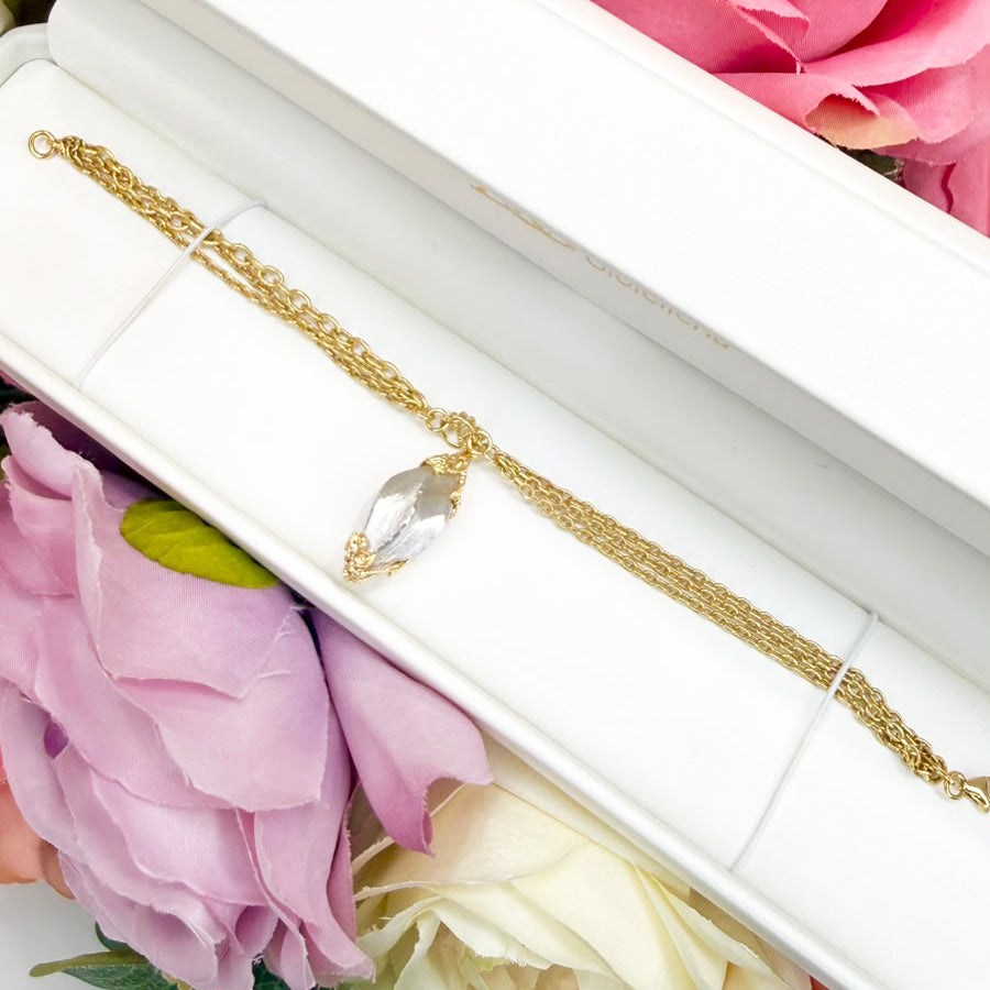 BRACCIALE IN ORO GIALLO 18 KT (750) A TRE FILI CON PENDENTE