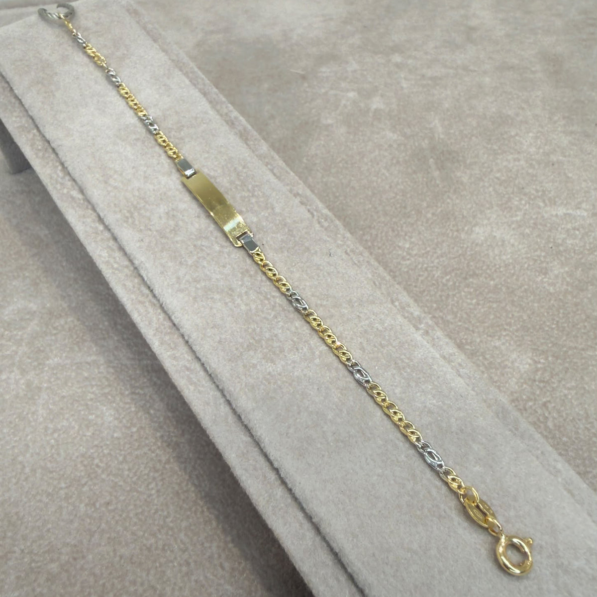 BRACCIALE BIMBO CON TARGHETTA IN ORO GIALLO E BIANCO 18 KT (750)
