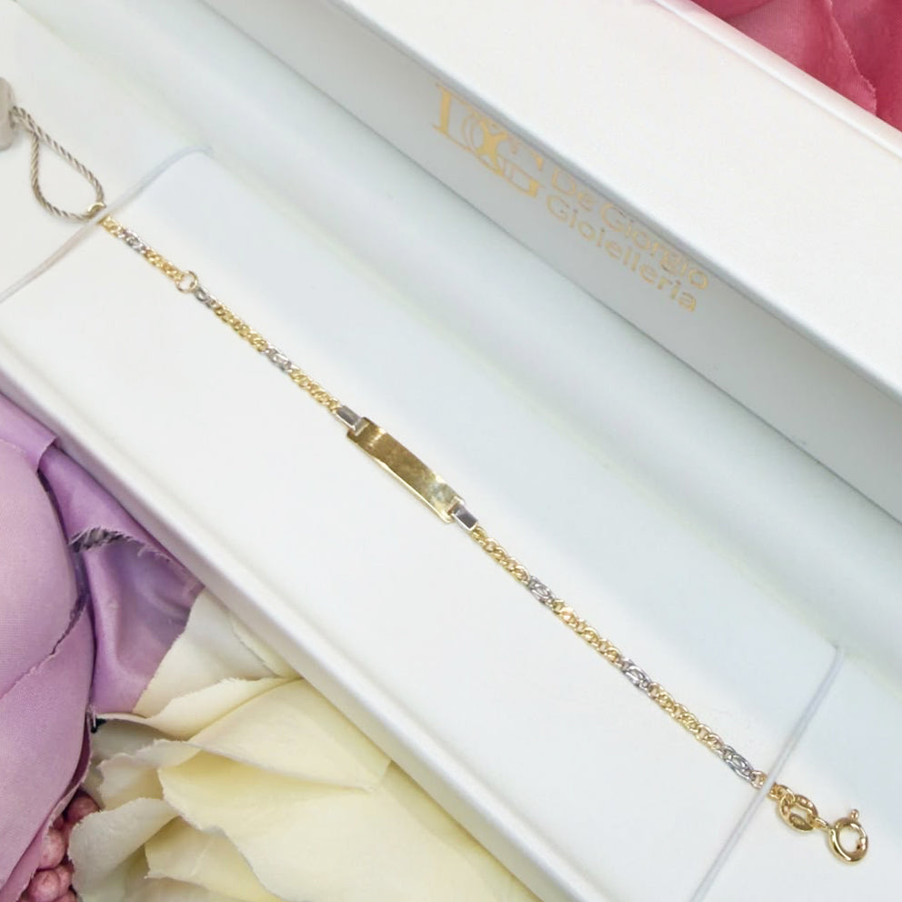 BRACCIALE BIMBO CON TARGHETTA IN ORO GIALLO E BIANCO 18 KT (750)