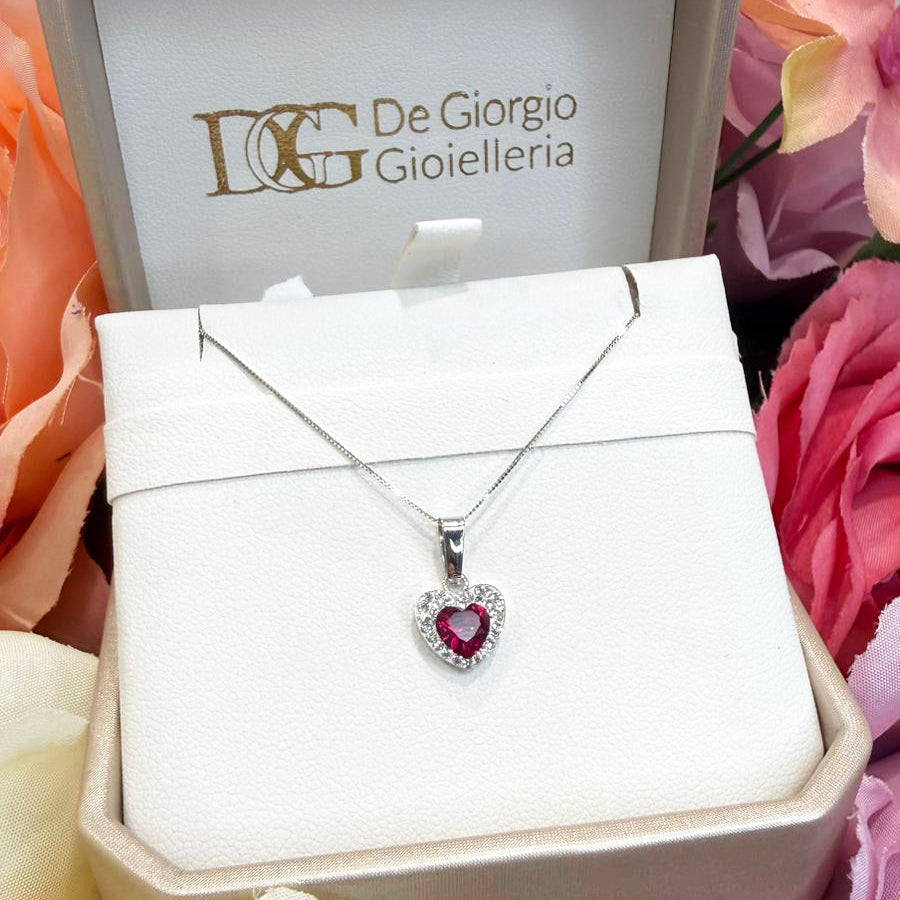 Ciondolo cuore da donna con pietra rossa e zirconi in oro bianco 18 Kt (750)