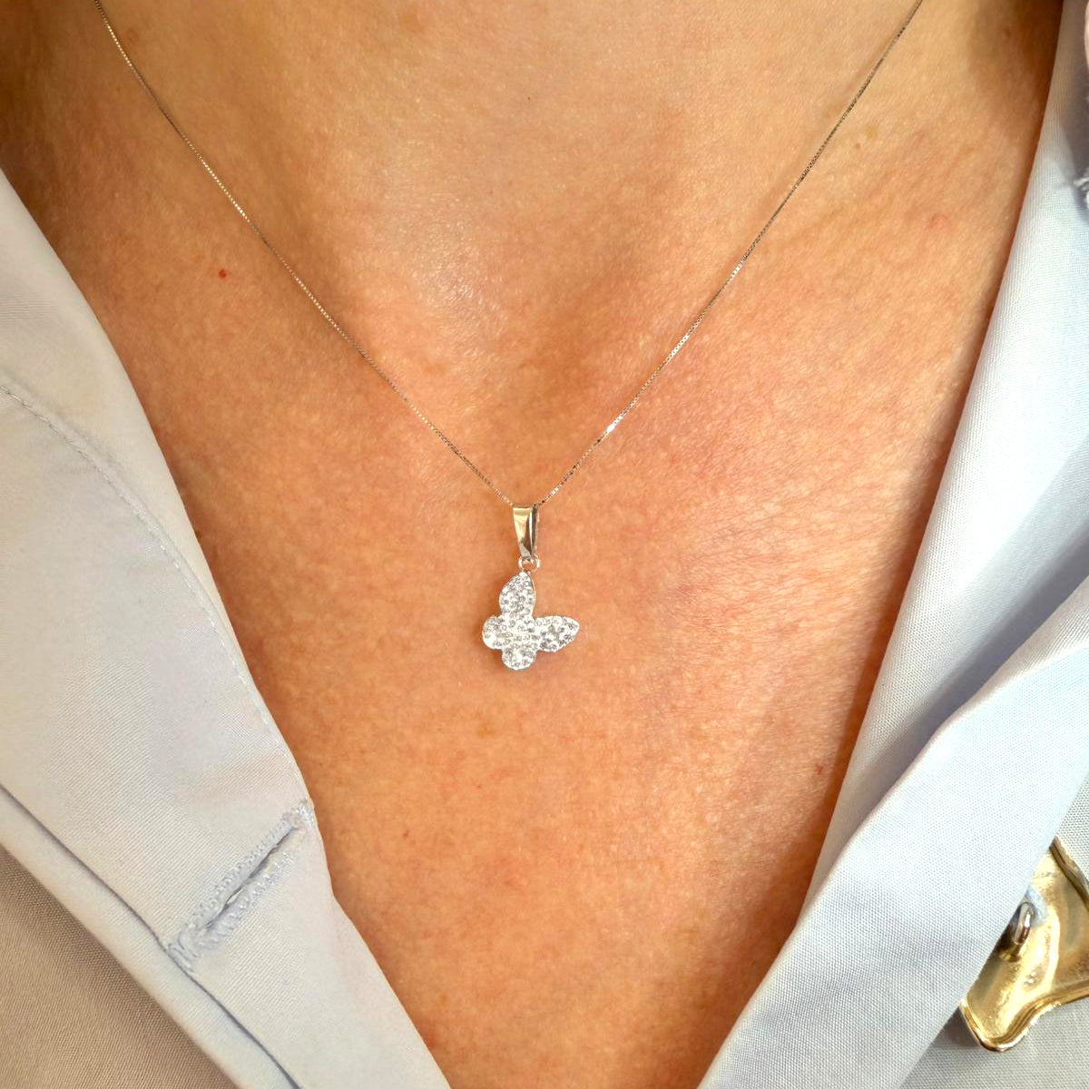 Ciondolo farfalla da donna con zirconi in oro bianco 18 Kt (750)