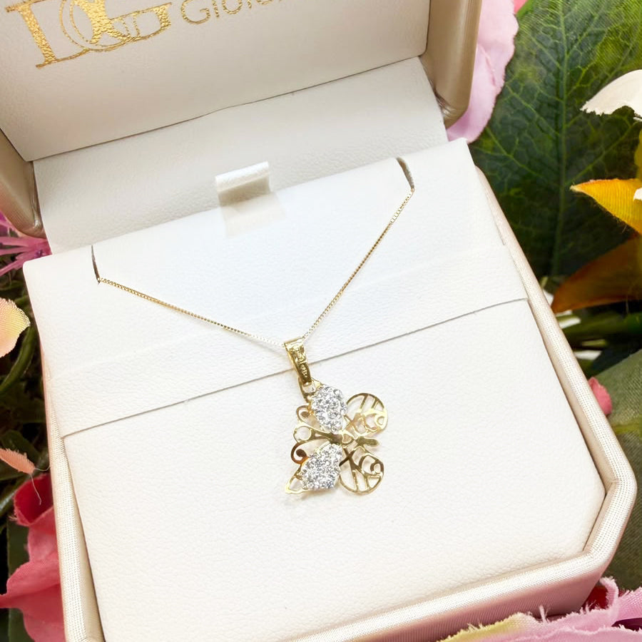 Collana con ciondolo farfalla e cuori zirconati in oro giallo 18 KT (750)