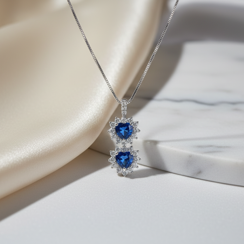 COLLANA BILOGY IN ORO 18KT CON DIAMANTI E CUORI DI ZAFFIRO