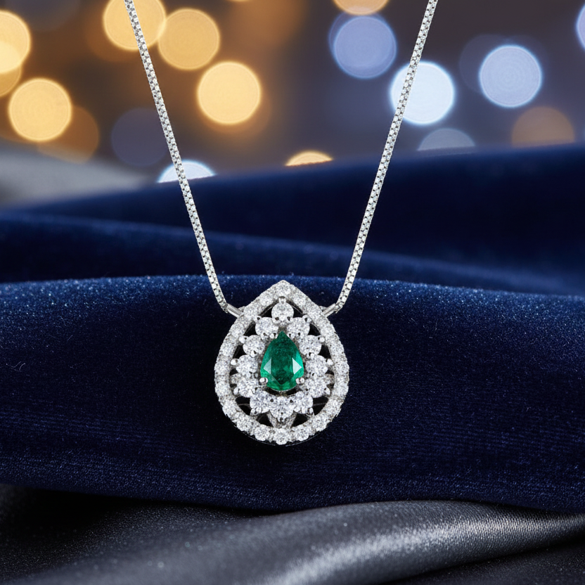 COLLANA GOCCIA IN ORO BIANCO 18KT CON DIAMANTI E SMERALDO