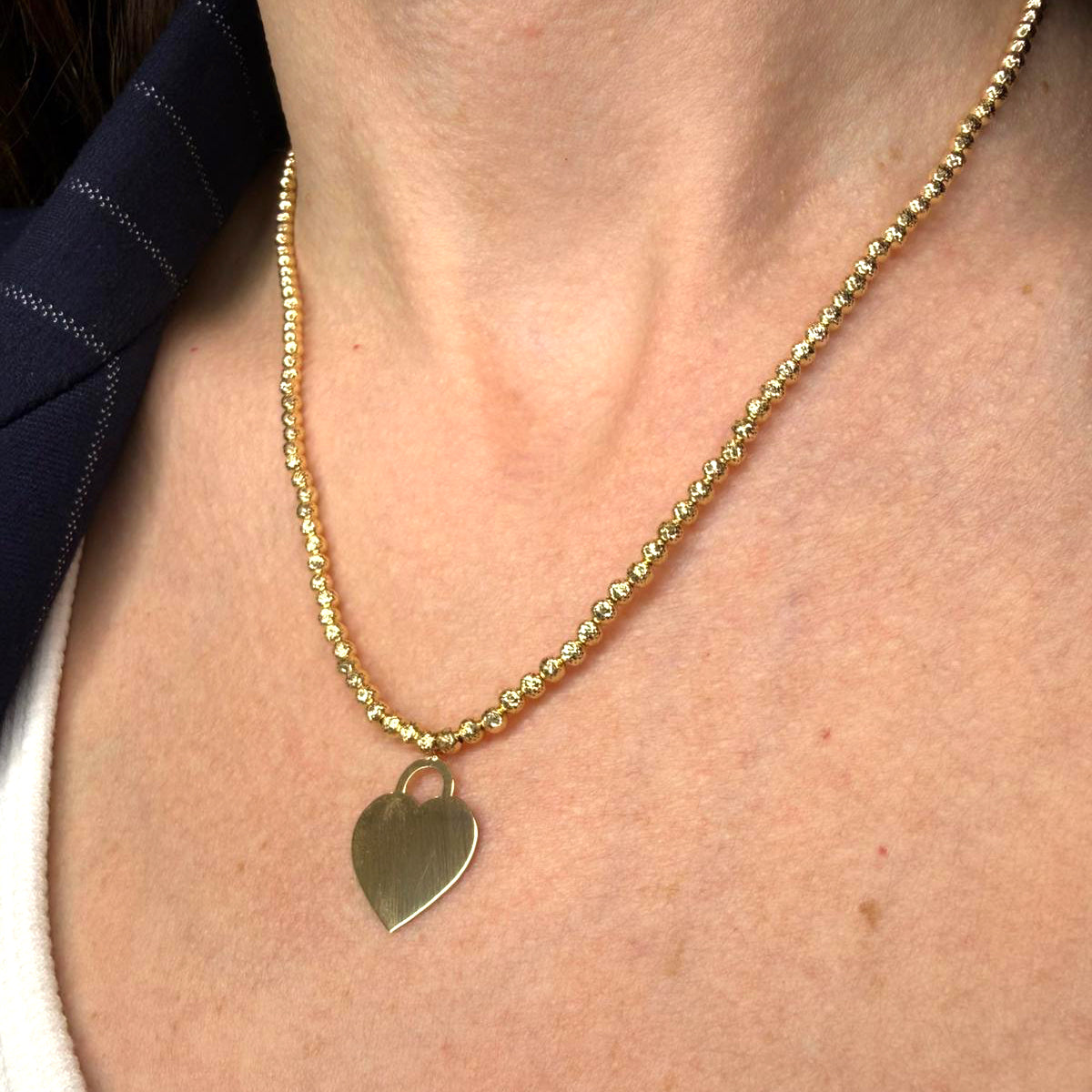 Collana con cuore incidibile in oro giallo 18KT (750) e sfere diamantate