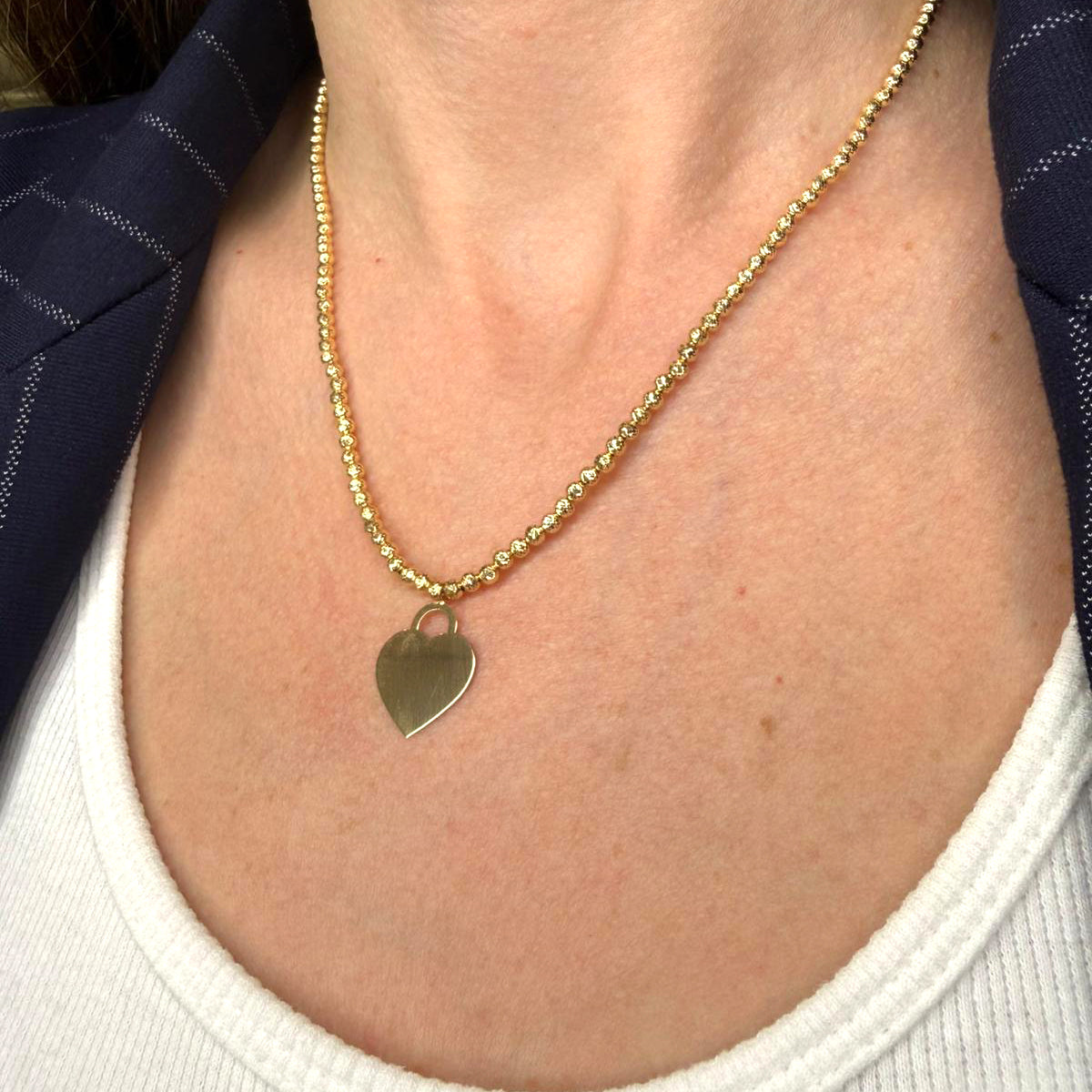 Collana con cuore incidibile in oro giallo 18KT (750) e sfere diamantate