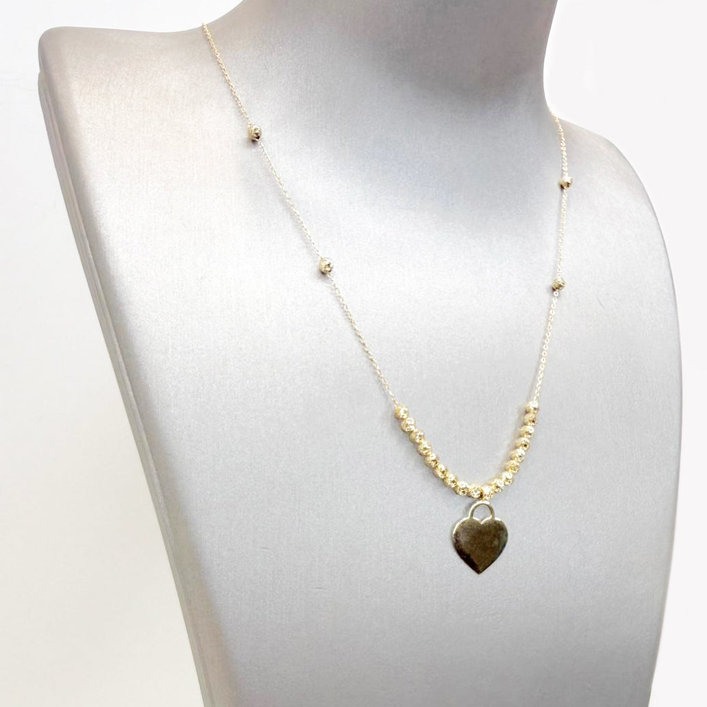 Collana con cuore incidibile in oro giallo 18KT (750) e sfere diamantate