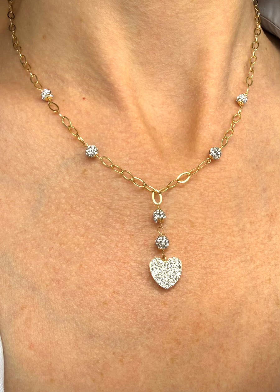 Collana con cuore pendente e sfere diamantate in oro giallo 18 KT (750)