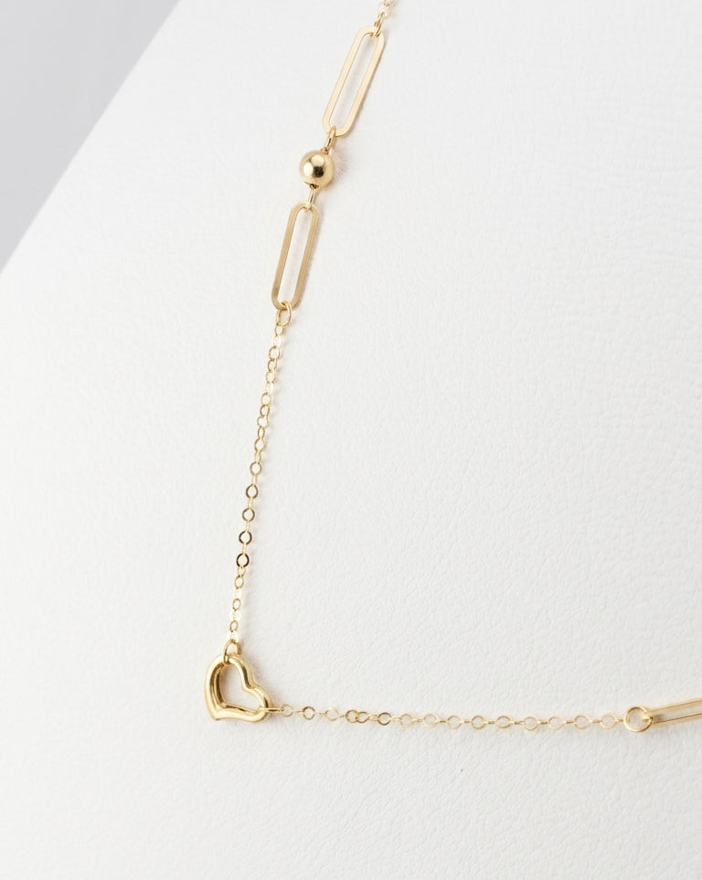 Collana con cuore e maglie geometriche in oro giallo 18 KT (750)