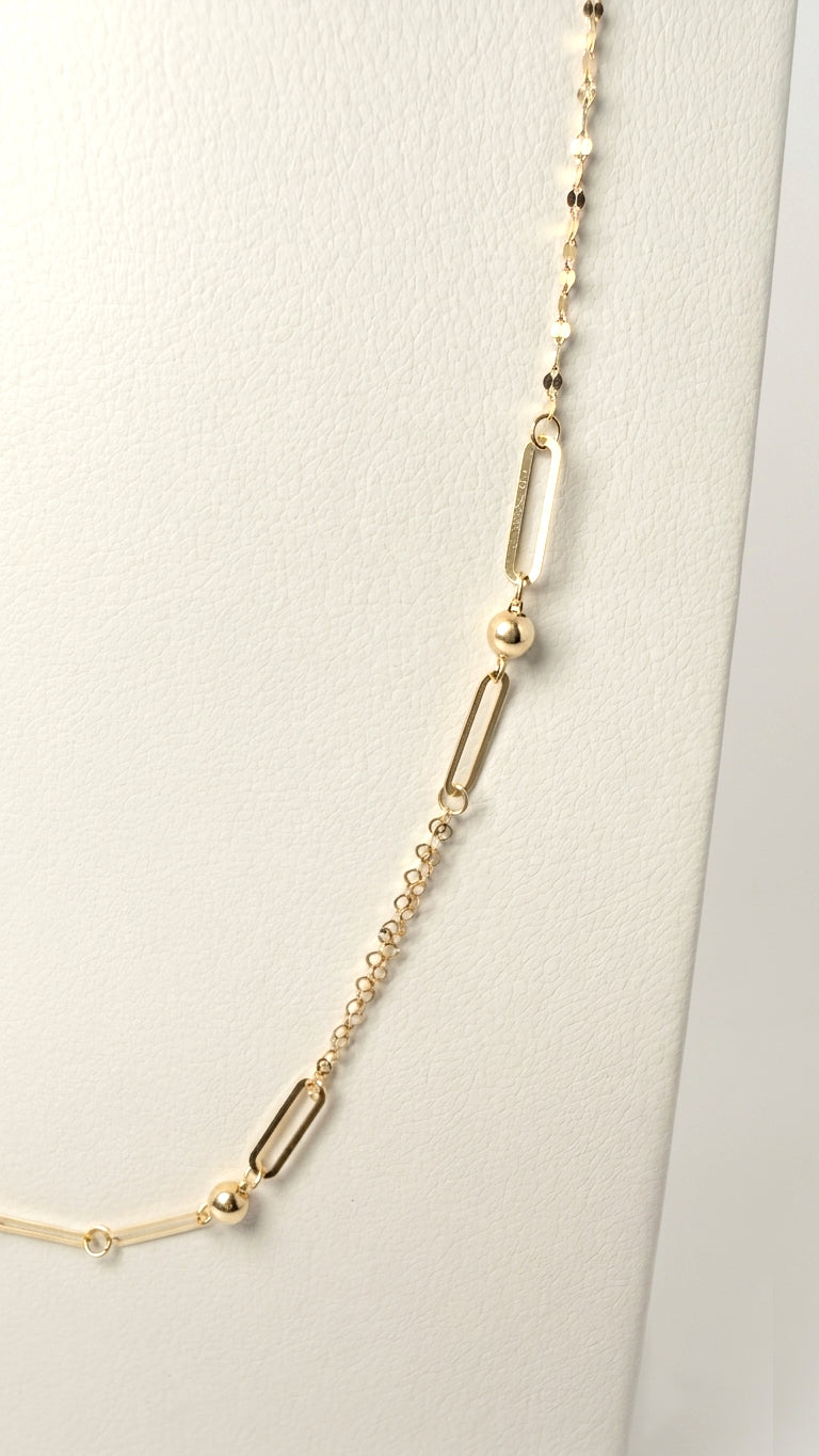 Collana con maglie geometriche e sfere in oro giallo 18 KT (750)