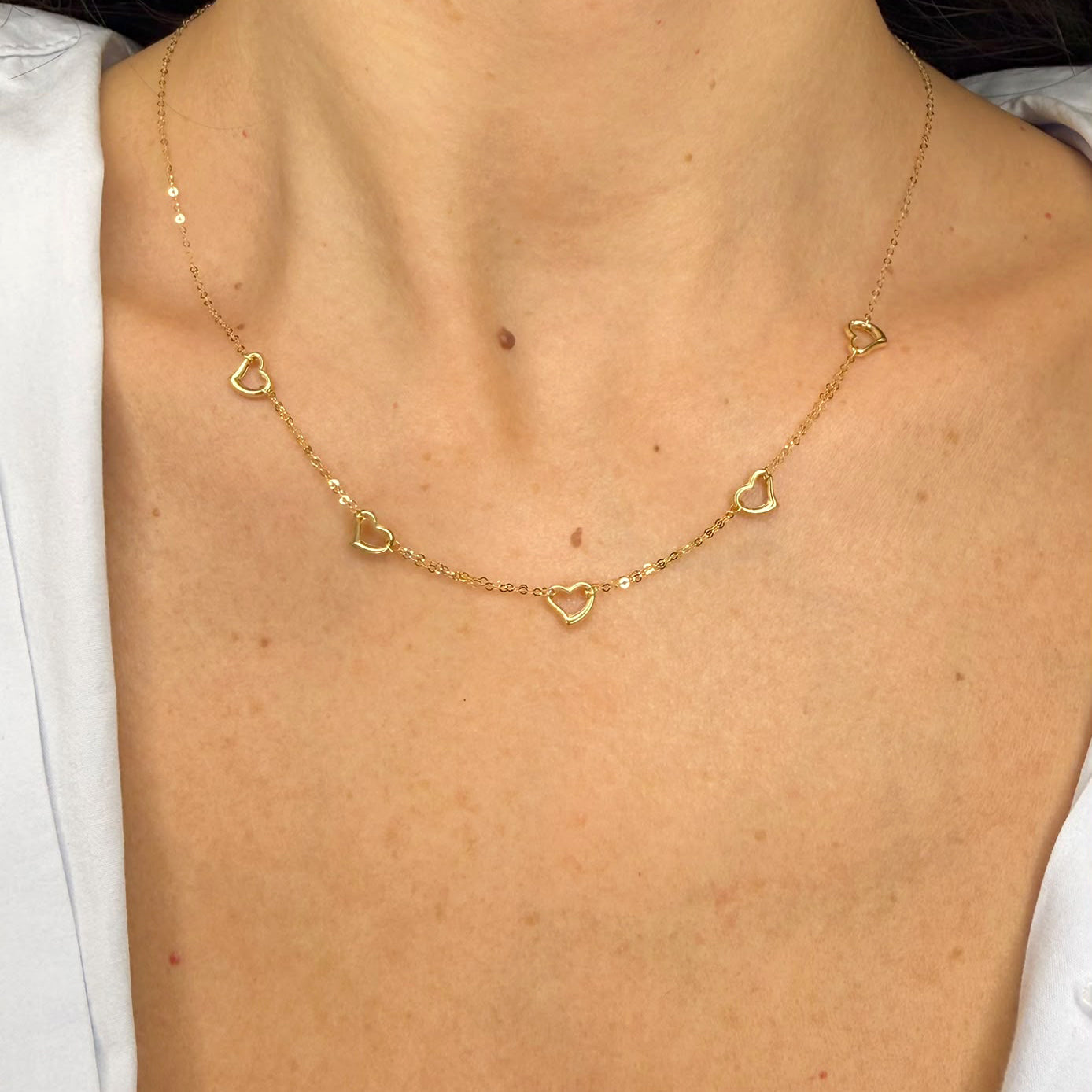 Collana con cuori traforati in oro giallo 18 KT (750)