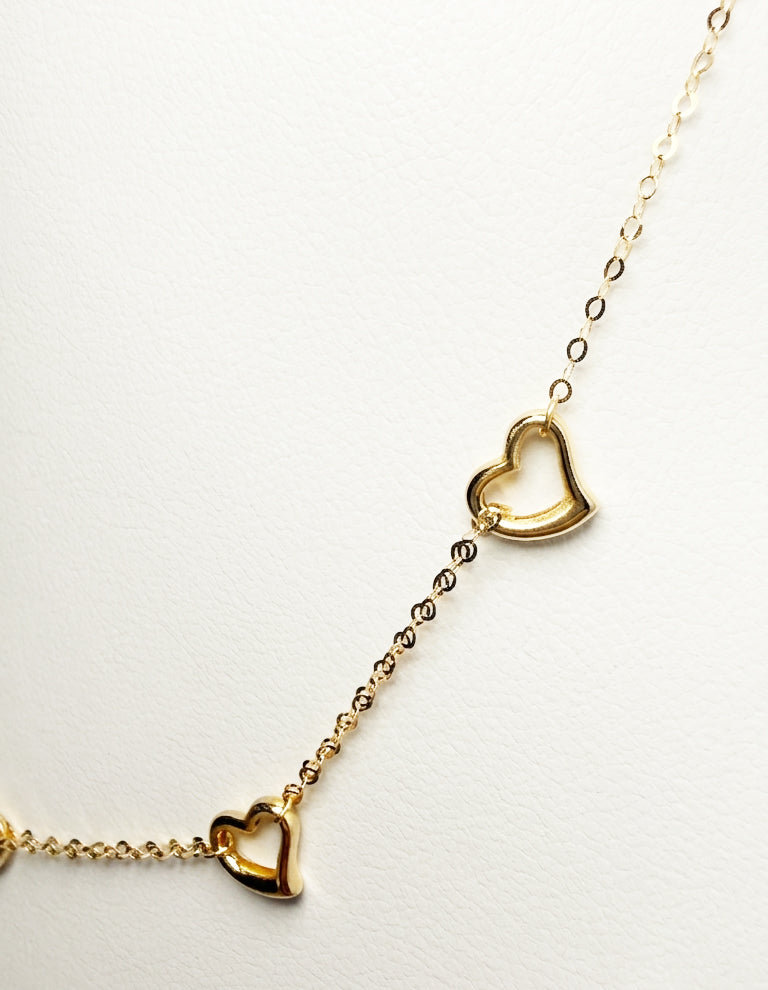 Collana con cuori traforati in oro giallo 18 KT (750)