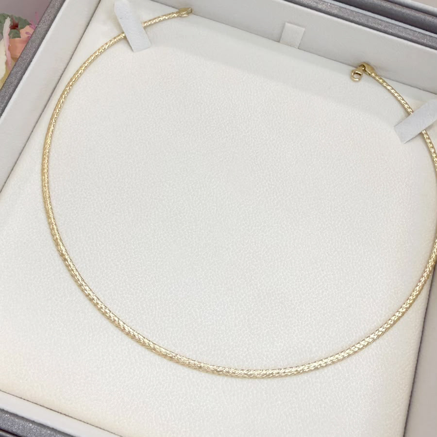 COLLANA SEMIRIGIDA IN ORO 18 KT