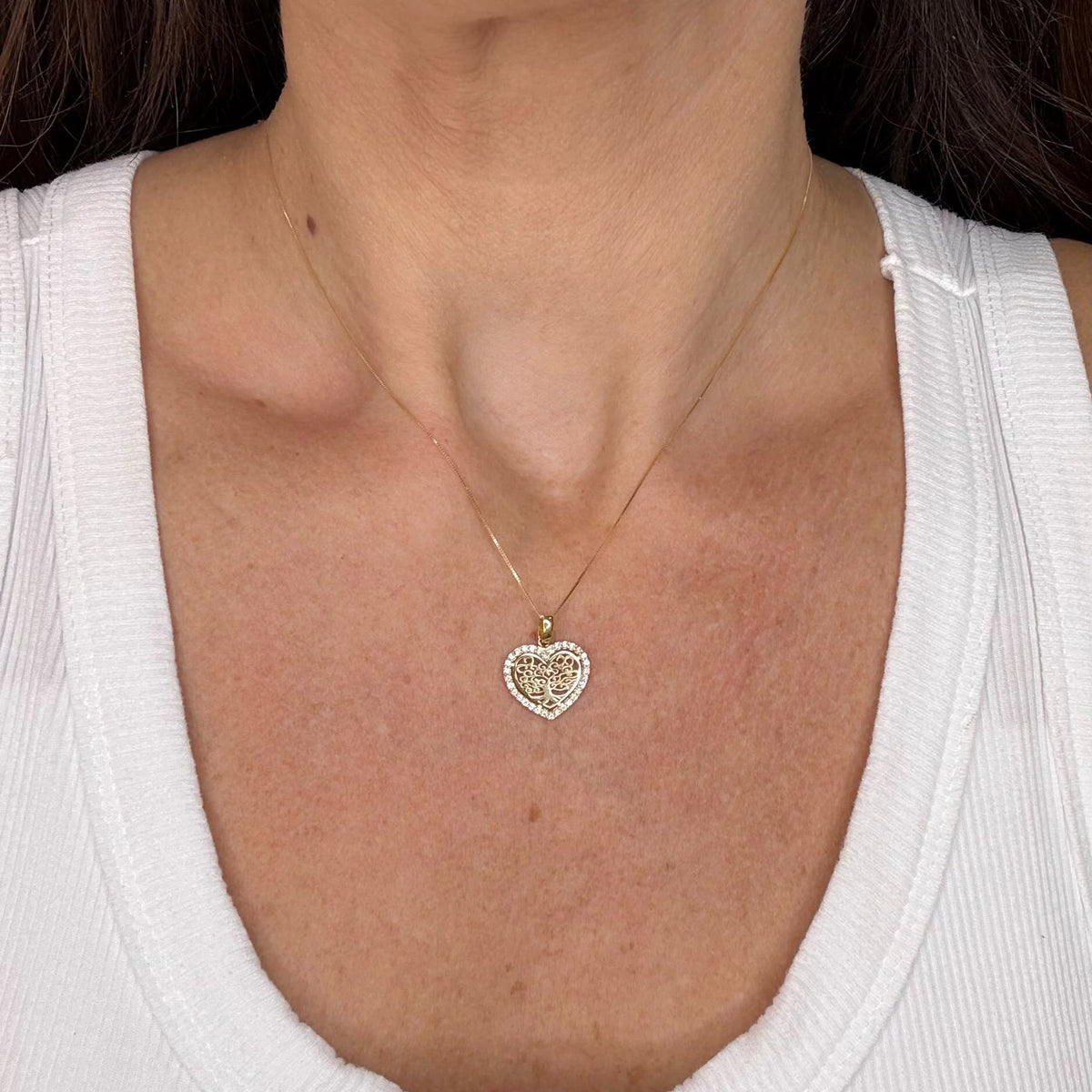 COLLANA CON PENDENTE CUORE ALBERO DELLA VITA E ZIRCONI IN ORO GIALLO 18 KT