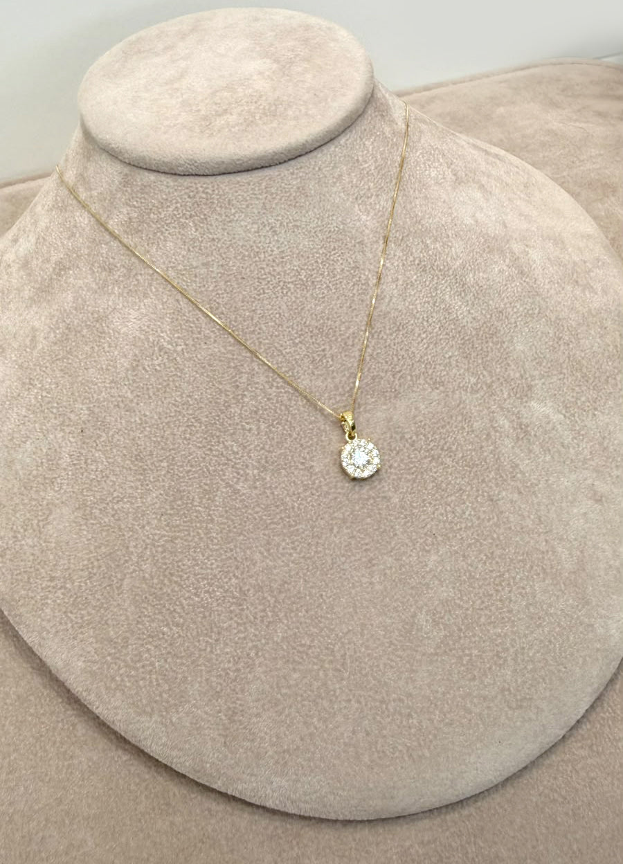COLLANA CON PENDENTE PUNTO LUCE TONDO CON ZIRCONI IN ORO GIALLO 18 KT