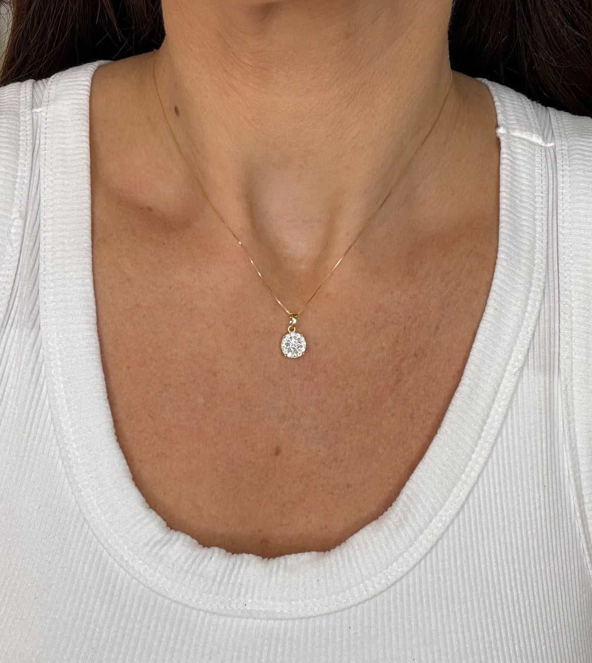 COLLANA CON PENDENTE PUNTO LUCE TONDO CON ZIRCONI IN ORO GIALLO 18 KT