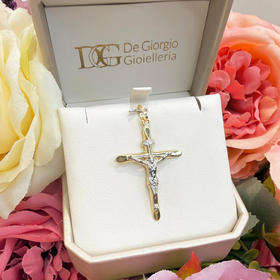 Ciondolo croce con Cristo da uomo in oro giallo e oro bianco 18 Kt (750)