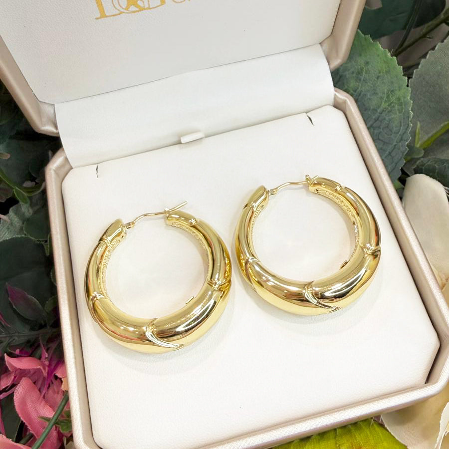 Orecchini a Cerchio Bombati Lavorati in Oro Giallo 18 KT