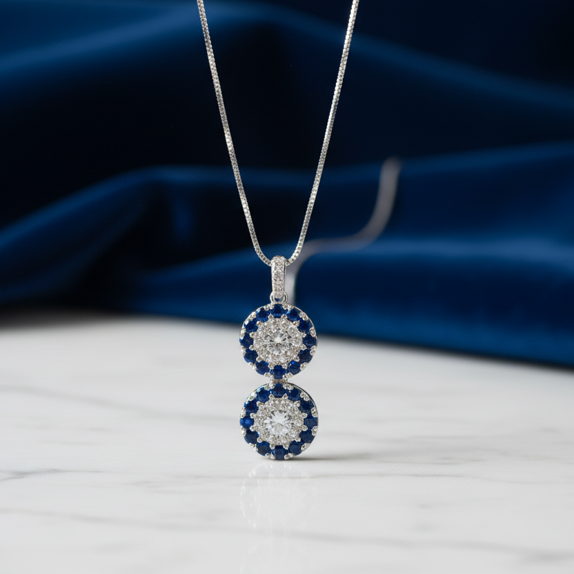 COLLANA BILOGY IN ORO BIANCO 18KT CON DIAMANTI E ZAFFIRI