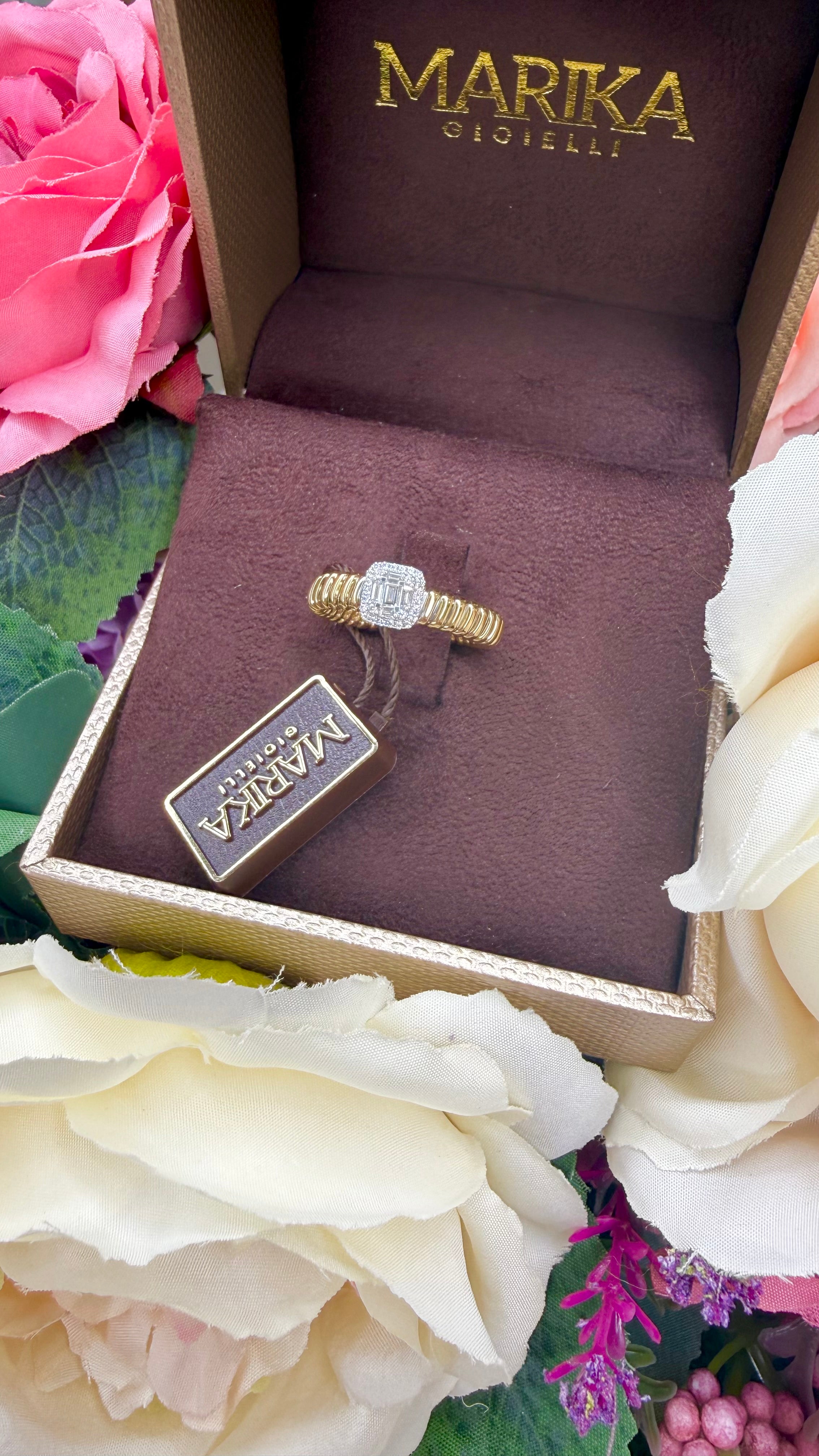ANELLO TUBOGAS IN ORO GIALLO 18 CARATI CON DIAMANTI