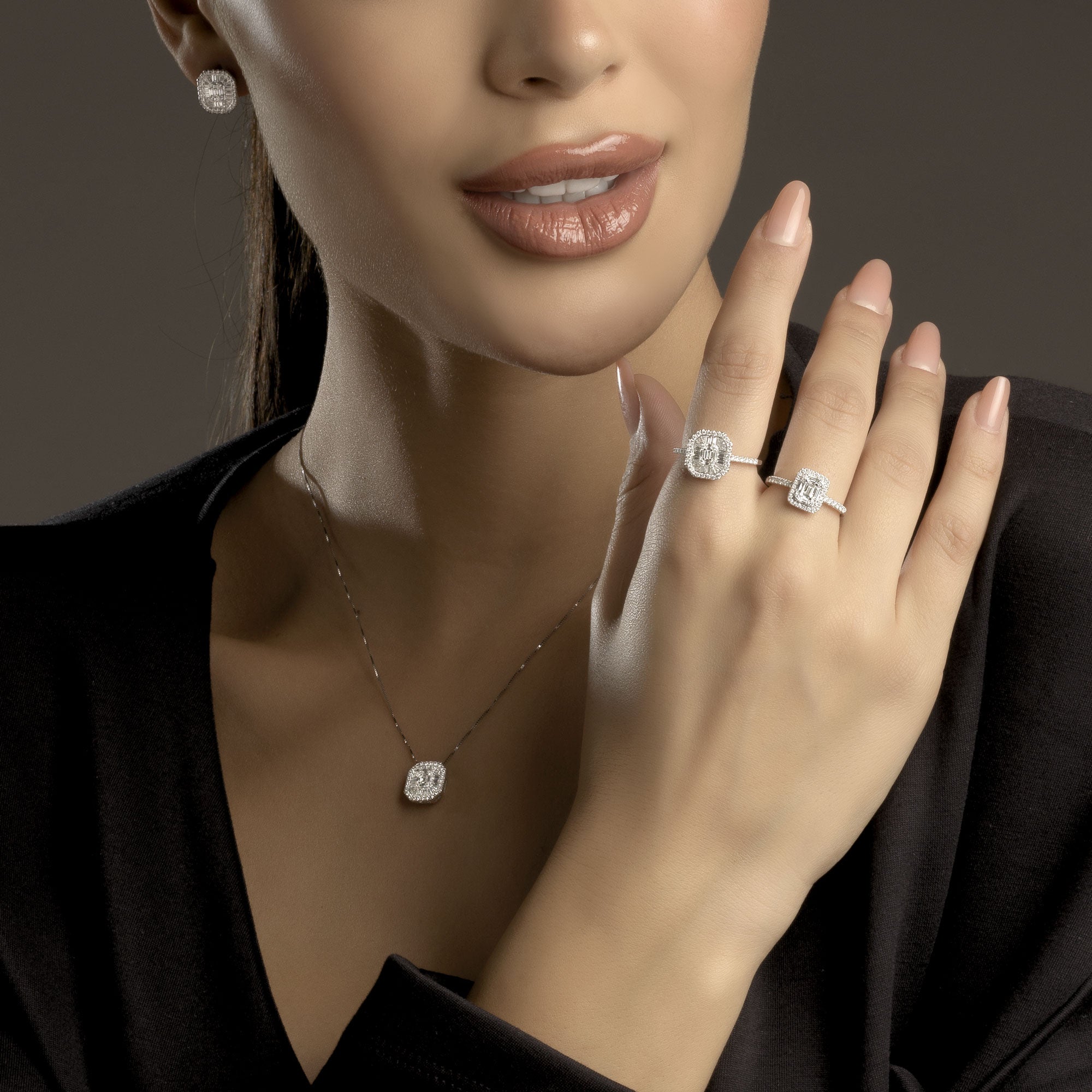 ANELLO OTTAGONALE IN ORO BIANCO 18KT DIAMANTI E BAGUETTE