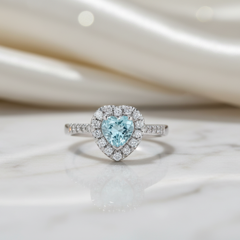 18KT WHITE GOLD HEART RING WITH DIAMONDS AND AQUAMARINE