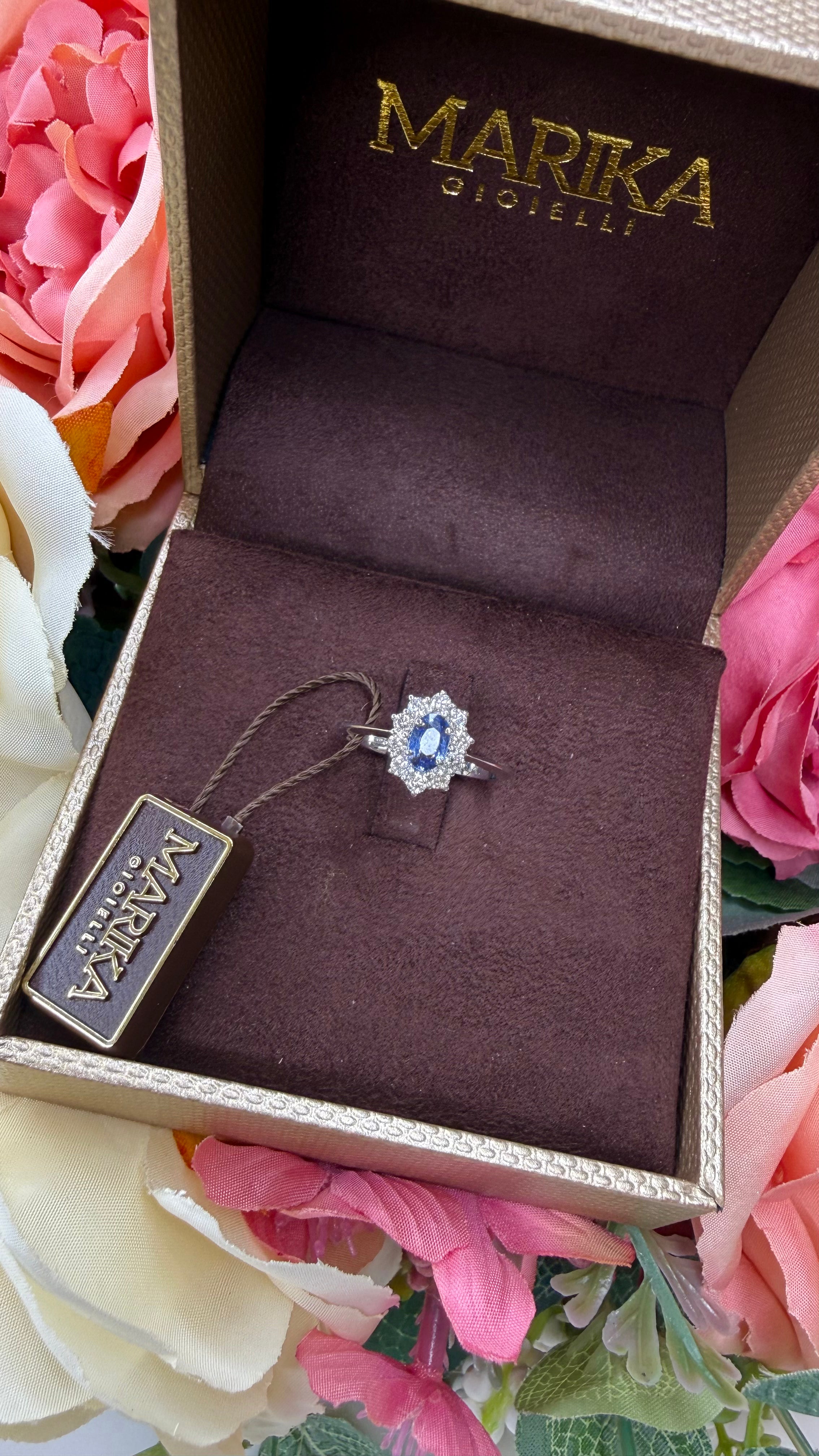 ANELLO IN ORO BIANCO 18 CARATI CON DIAMANTI E ZAFFIRO