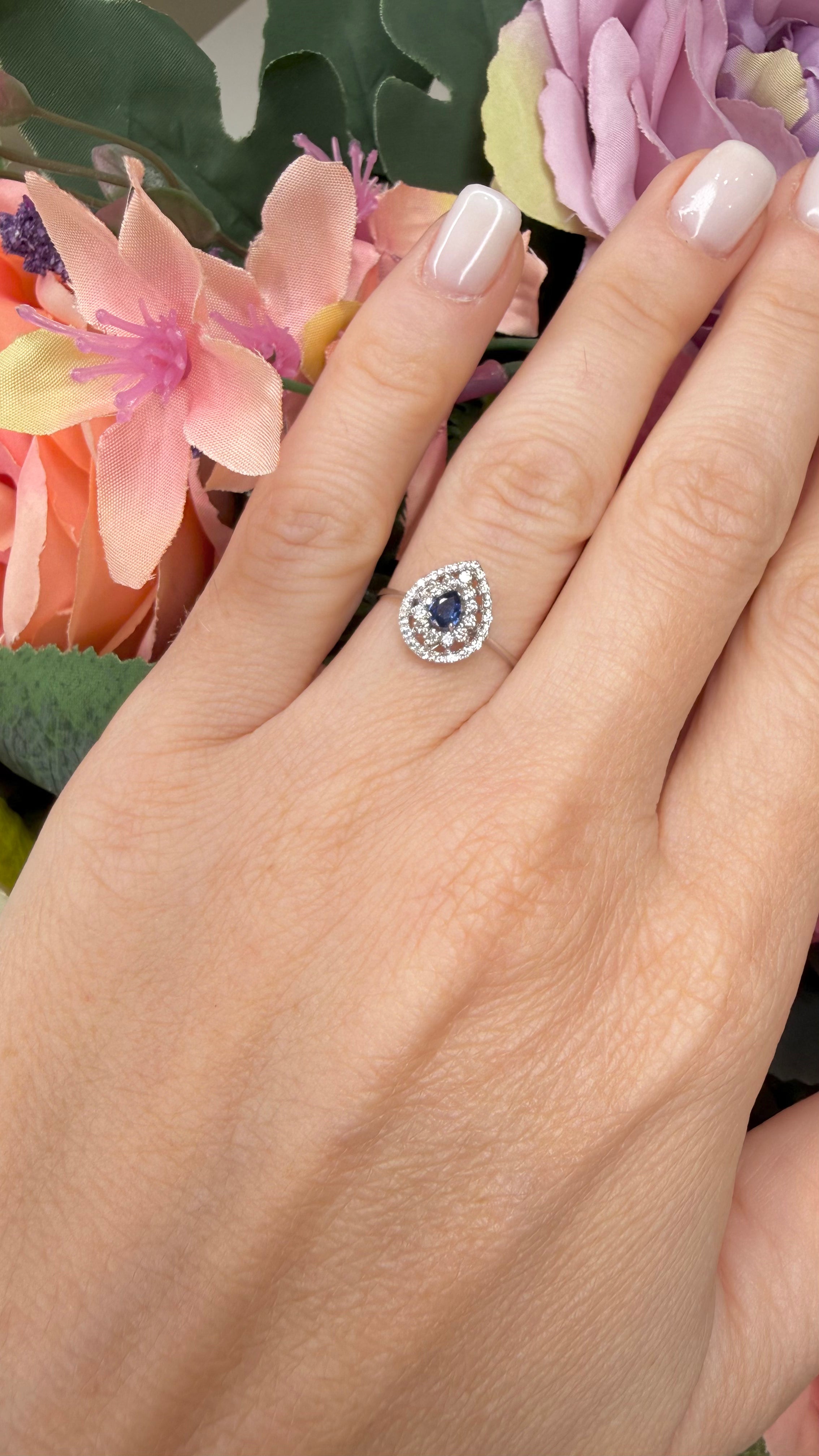 18KT WHITE GOLD DROP RING WITH DIAMONDS AND SAPPHIRE