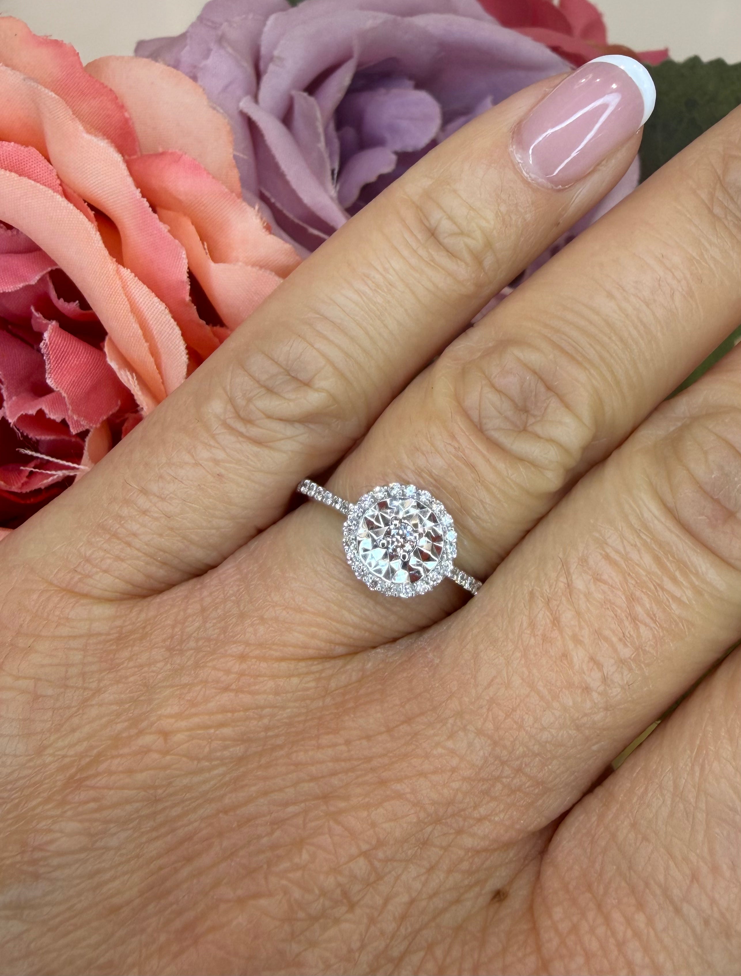 ANELLO SOLITARIO IN ORO BIANCO 18 CARATI E DIAMANTI