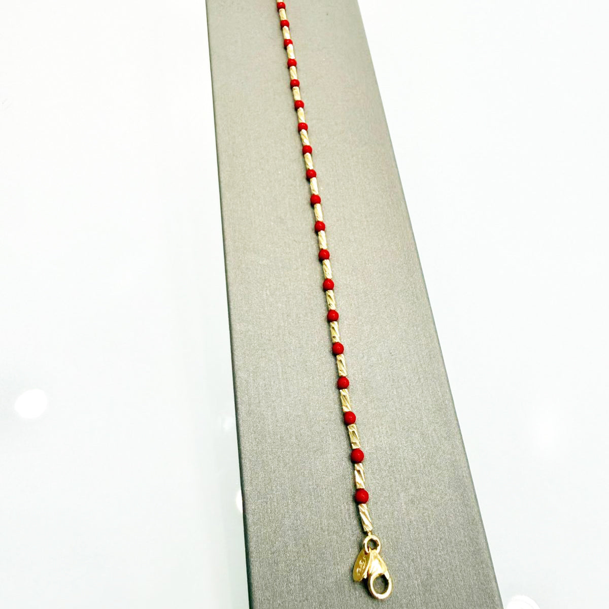Bracciale con sfere rosse in oro giallo 18KT (750) – Unisex elegante