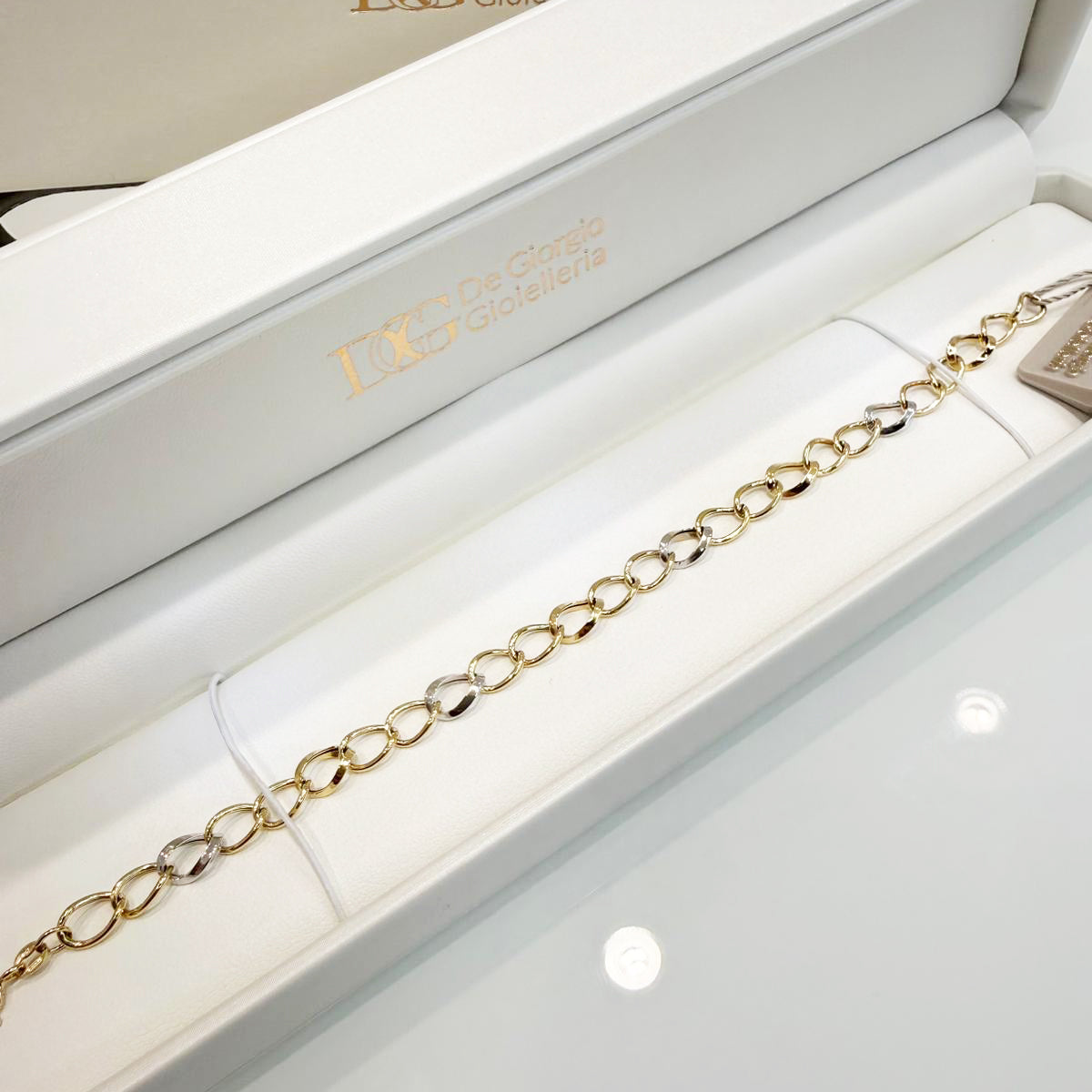 Bracciale in oro giallo e bianco 18KT (750) a maglia alternata