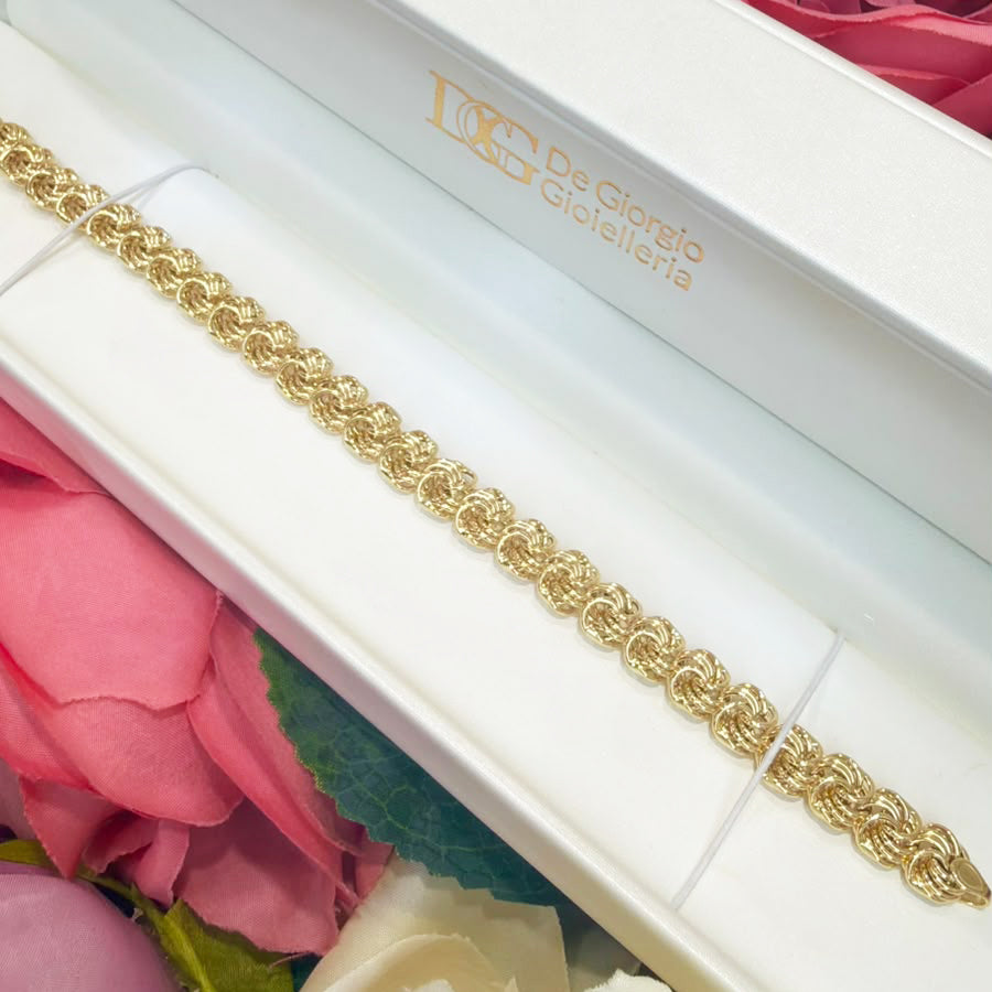 BRACCIALE A MAGLIE INTRECCIATE IN ORO GIALLO 18 KT