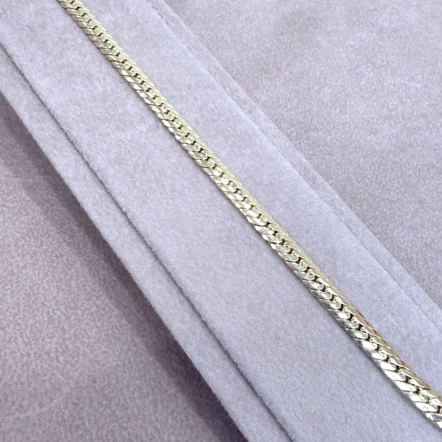 BRACCIALE A MAGLIA PIATTA LAVORATA IN ORO GIALLO 18 KT