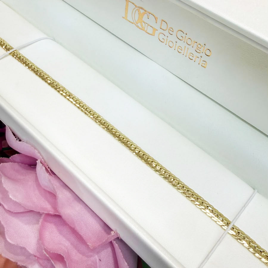 BRACCIALE A MAGLIA PIATTA LAVORATA IN ORO GIALLO 18 KT