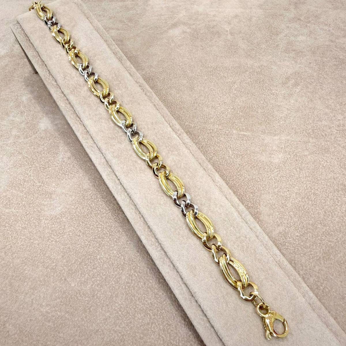 BRACCIALE IN ORO GIALLO E BIANCO 18 KT (750) CON MAGLIE OVALI