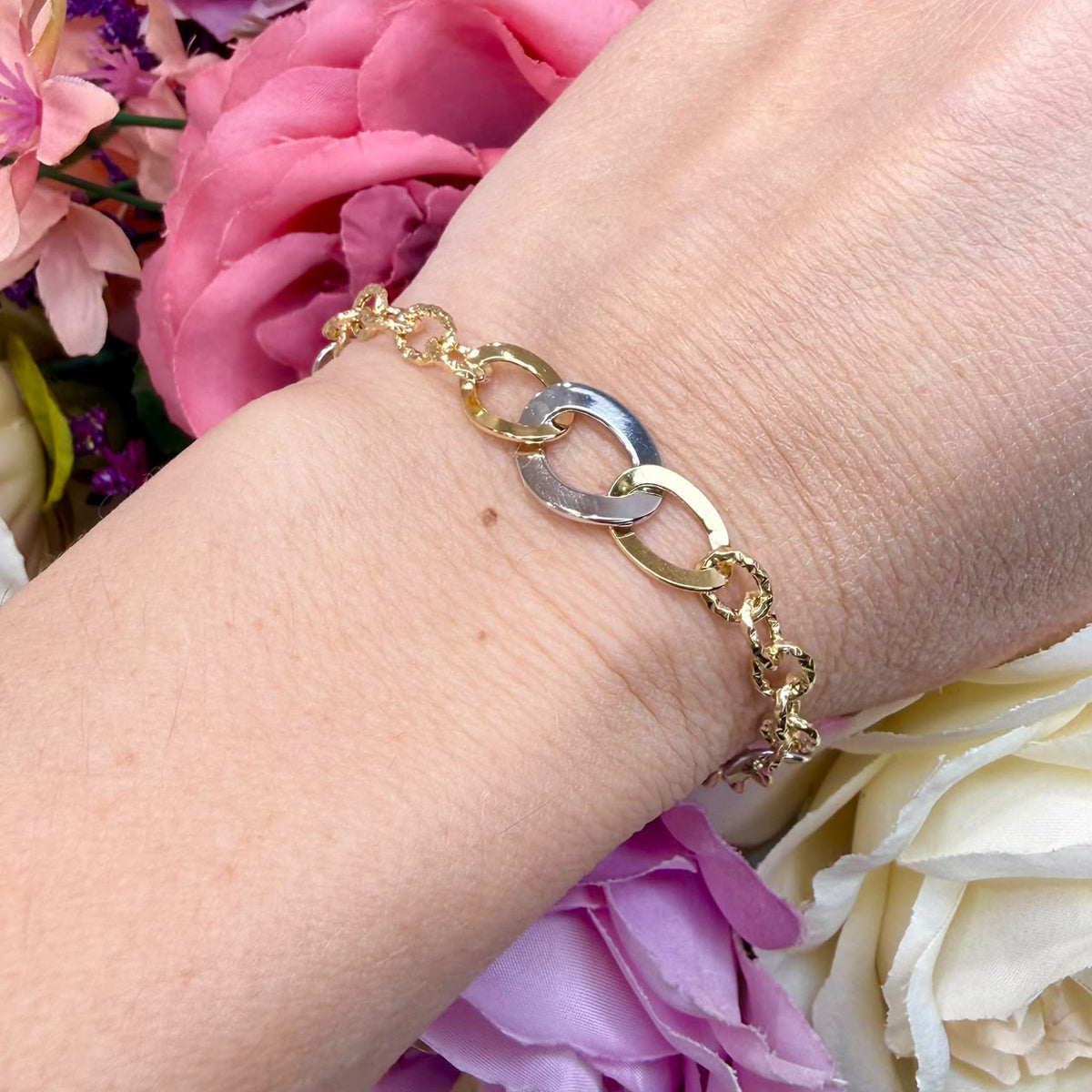 BRACCIALE IN ORO GIALLO E BIANCO 18 KT (750) CON MAGLIE OVALI