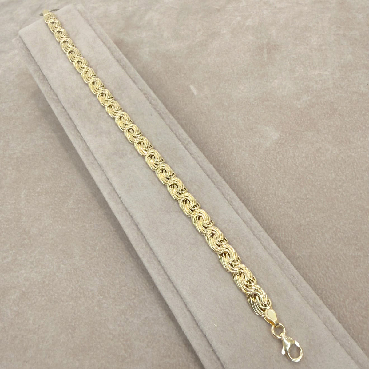 BRACCIALE A MAGLIA INTRECCIATA IN ORO GIALLO 18 KT (750)