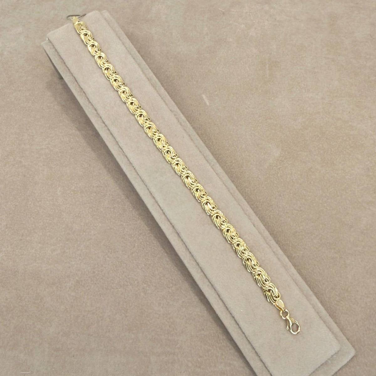 BRACCIALE A MAGLIA INTRECCIATA IN ORO GIALLO 18 KT (750)