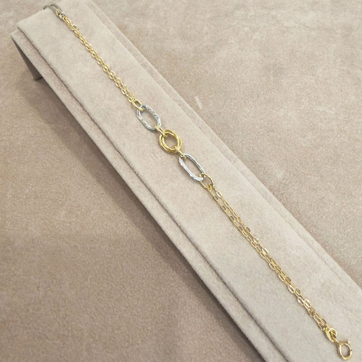 BRACCIALE IN ORO GIALLO E BIANCO 18 KT (750) CON ELEMENTI OVALI