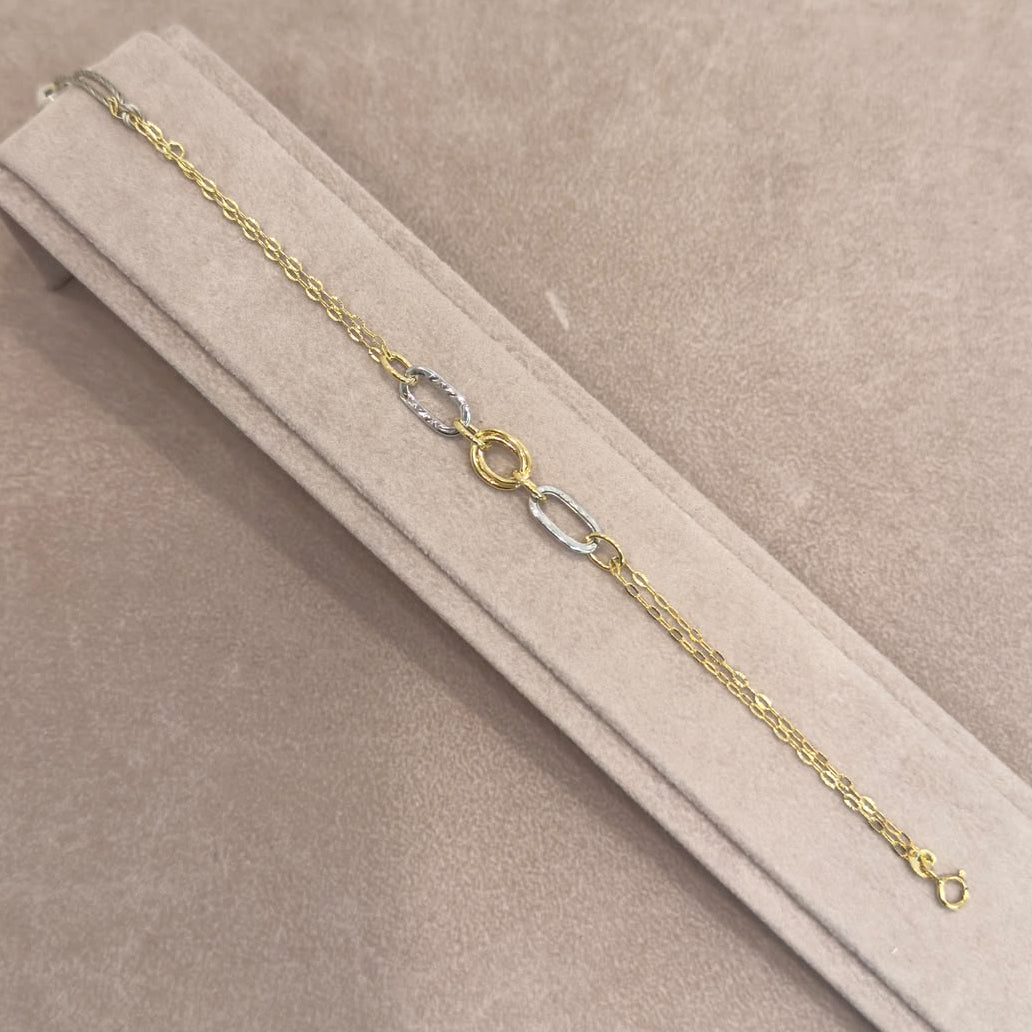 BRACCIALE IN ORO GIALLO E BIANCO 18 KT (750) CON ELEMENTI OVALI