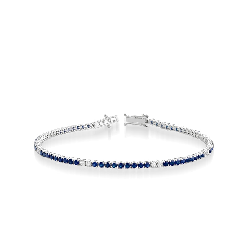 BRACCIALE TENNIS IN ORO BIANCO 18KT CON DIAMANTI E ZAFFIRI
