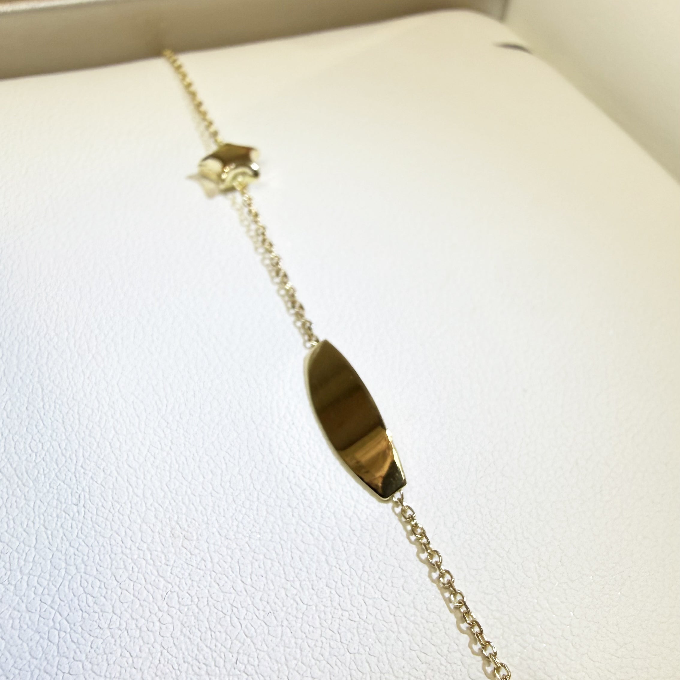 BRACCIALE BAMBINA CON TARGHETTA E STELLINA IN ORO GIALLO 18KT (750)